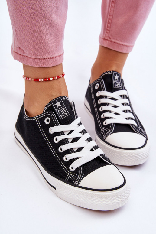 Zapatos de ocio modelo clásico en color negro con suela blanca Ecoma