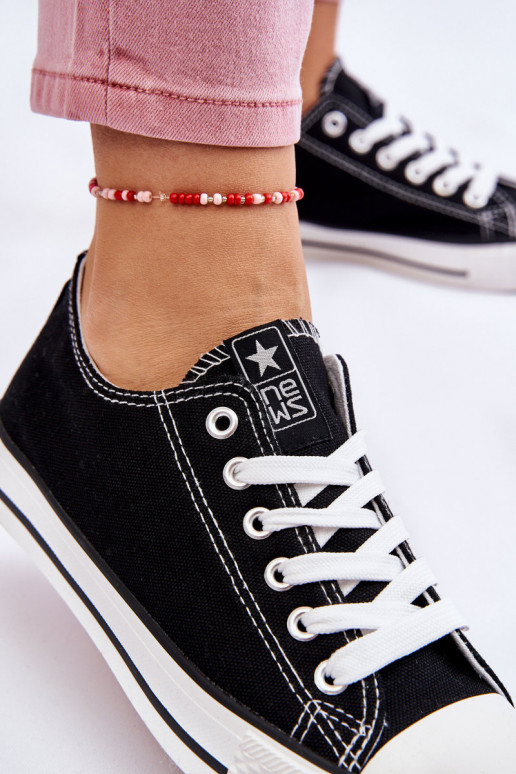 Zapatos de ocio modelo clásico en color negro con suela blanca Ecoma