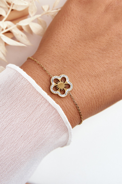 Pulsera con flores en color dorado. Pulsera con flores en color dorado.