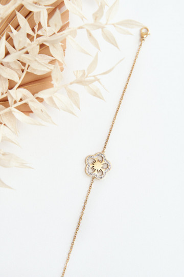 Pulsera con flores en color dorado. 2