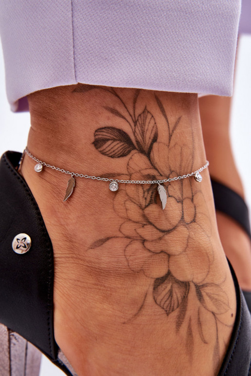 Pulsera para pierna con plumas y circonitas en color plata. Pulsera para pierna con plumas y circonitas en color plata.