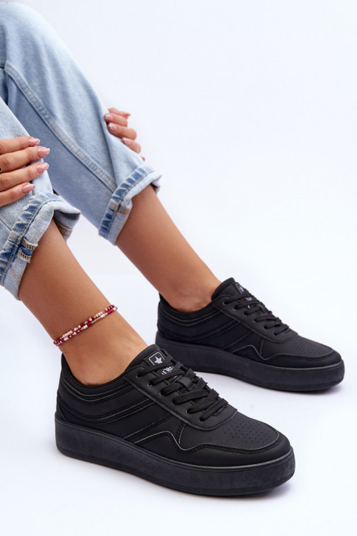 Zapatillas deportivas con plataforma en color negro Pudina. Zapatillas deportivas con plataforma en color negro Pudina.