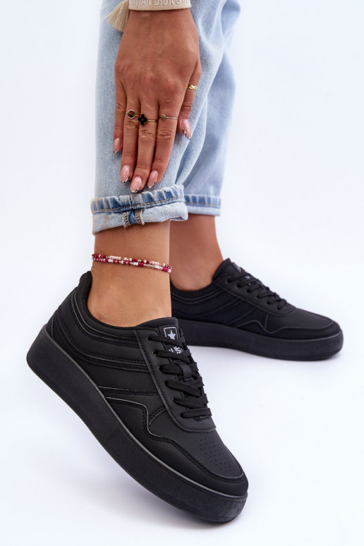 Zapatillas deportivas con plataforma en color negro Pudina. Zapatillas deportivas con plataforma en color negro Pudina.