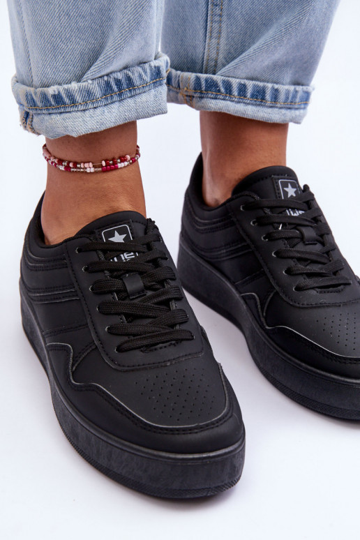 Zapatillas deportivas con plataforma en color negro Pudina. Zapatillas deportivas con plataforma en color negro Pudina.