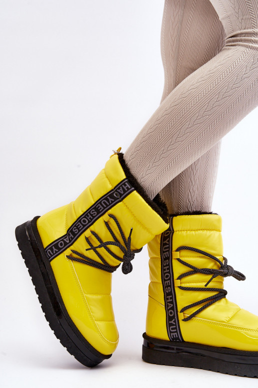 botas de nieve con detalles elegantes en amarillo Lilara