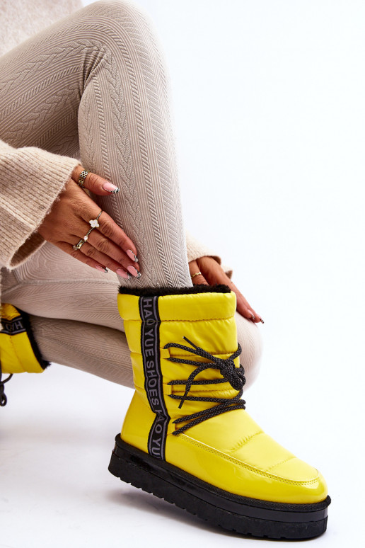 botas de nieve con detalles elegantes en amarillo Lilara botas de nieve con detalles elegantes en amarillo Lilara