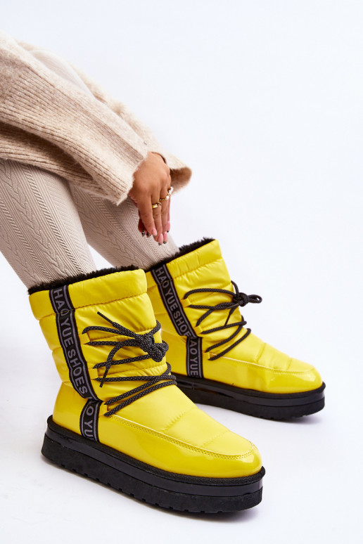 botas de nieve con detalles elegantes en amarillo Lilara