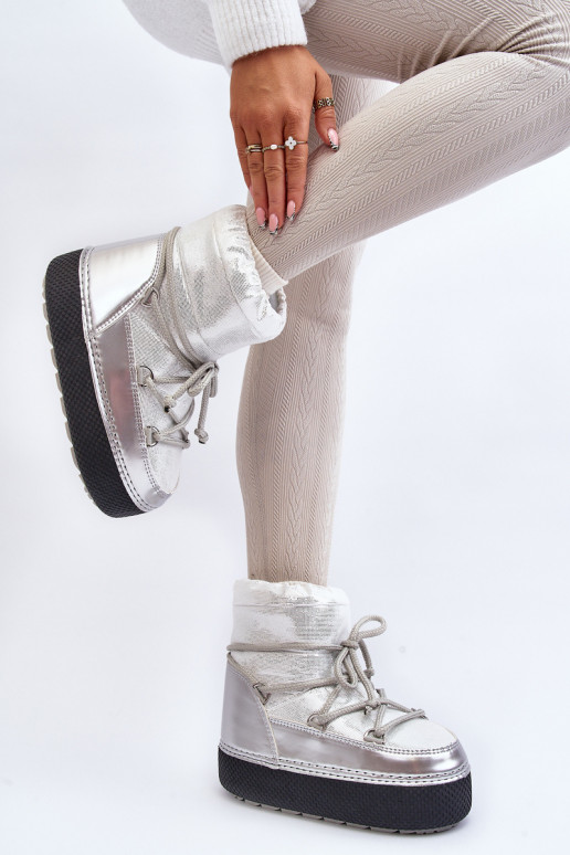 botas de nieve con detalles elegantes en plateado Toolsa