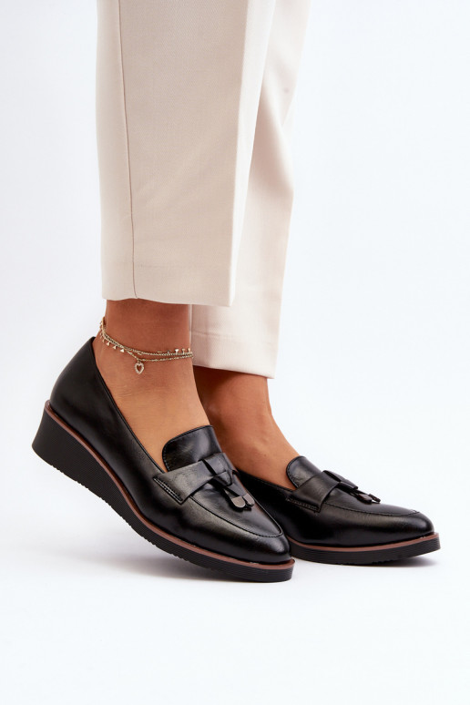 Zapatos con adornos en color negro Miliret.