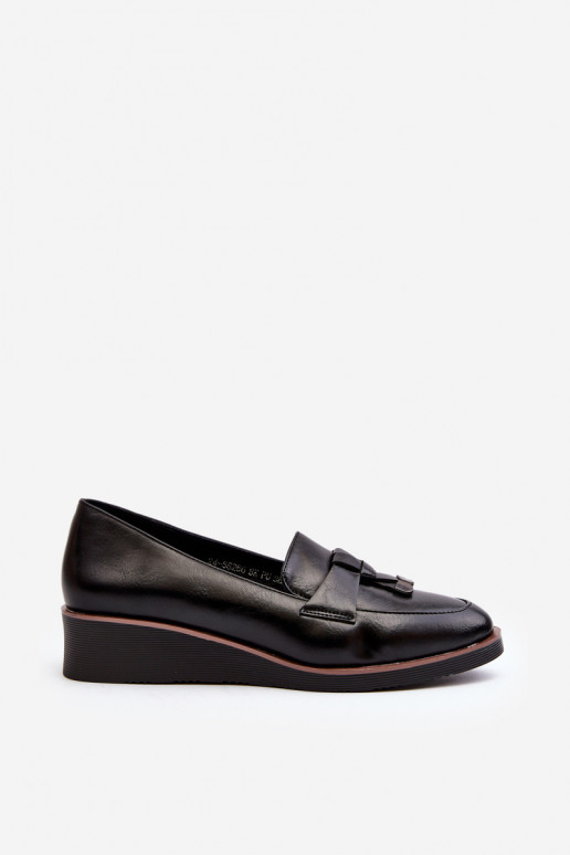 Zapatos con adornos en color negro Miliret.