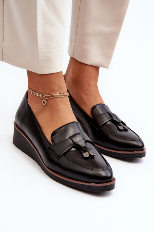 Zapatos con adornos en color negro Miliret.
