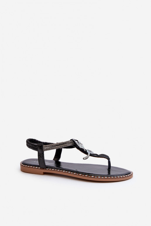 Sandalias planas para mujer con flores en color negro Edoni