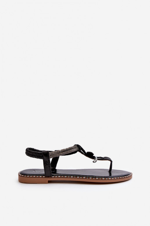 Sandalias planas para mujer con flores en color negro Edoni