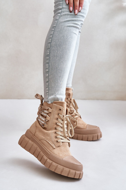 Botas de mujer con una plataforma Con decoraciones atándosem color marrón Edidda