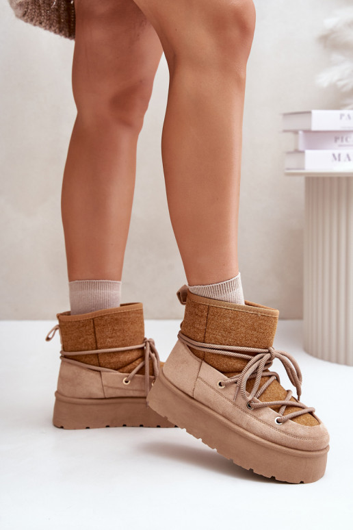 Botas de nieve con detalles elegantes con una plataforma color marrón Tiene quevora Botas de nieve con detalles elegantes con una plataforma color marrón Tiene quevora