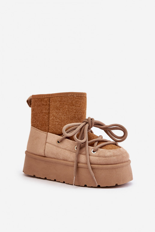 Botas de nieve con detalles elegantes con una plataforma color marrón Tiene quevora Botas de nieve con detalles elegantes con una plataforma color marrón Tiene quevora