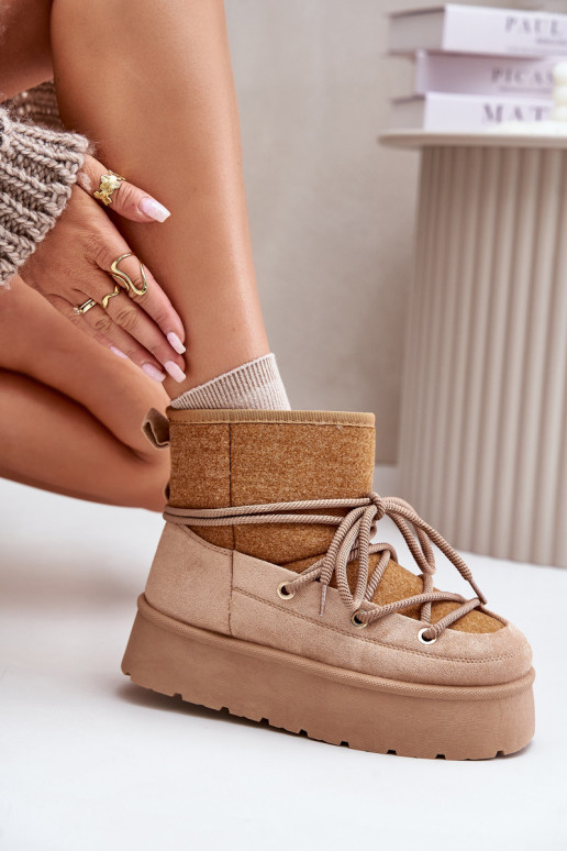 Botas de nieve con detalles elegantes con una plataforma color marrón Tiene quevora Botas de nieve con detalles elegantes con una plataforma color marrón Tiene quevora