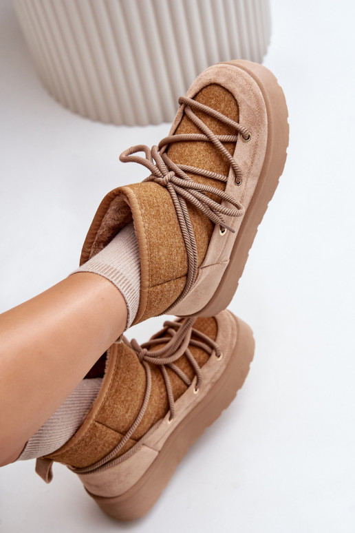 Botas de nieve con detalles elegantes con una plataforma color marrón Tiene quevora Botas de nieve con detalles elegantes con una plataforma color marrón Tiene quevora