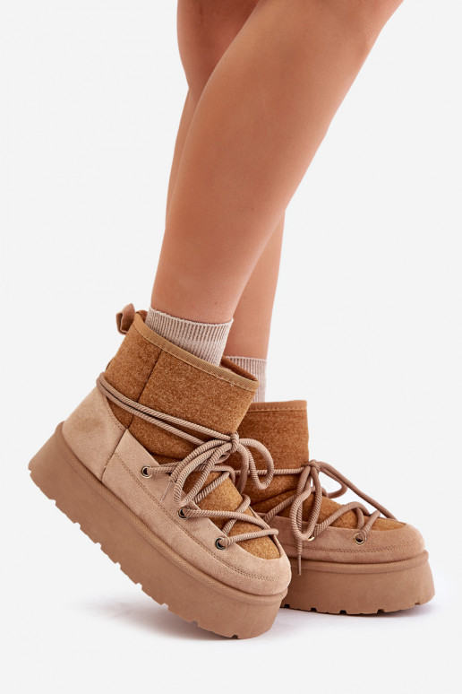 Botas de nieve con detalles elegantes con una plataforma color marrón Tiene quevora Botas de nieve con detalles elegantes con una plataforma color marrón Tiene quevora