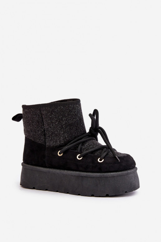 Botas de nieve con detalles elegantes con una plataforma de color negro Tiene quevora Botas de nieve con detalles elegantes con una plataforma de color negro Tiene quevora