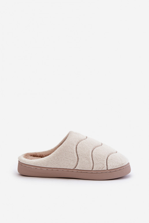 Cálidas zapatillas de piel en beige Vamirae