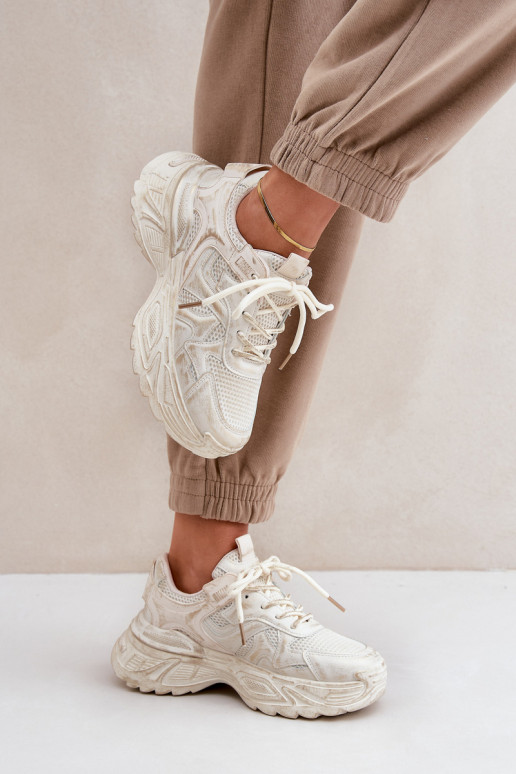 Botines de estilo sneaker para mujer Z con desgastes y plataforma en color arena SeladĮen
