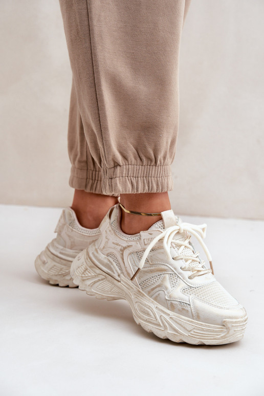 Botines de estilo sneaker para mujer Z con desgastes y plataforma en color arena SeladĮen