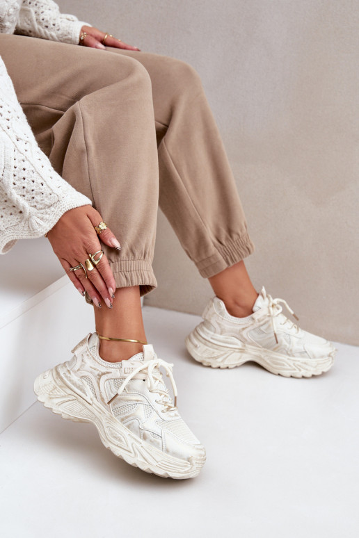 Botines de estilo sneaker para mujer Z con desgastes y plataforma en color arena SeladĮen