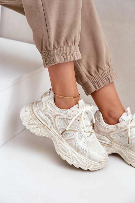 Botines de estilo sneaker para mujer Z con desgastes y plataforma en color arena SeladĮen