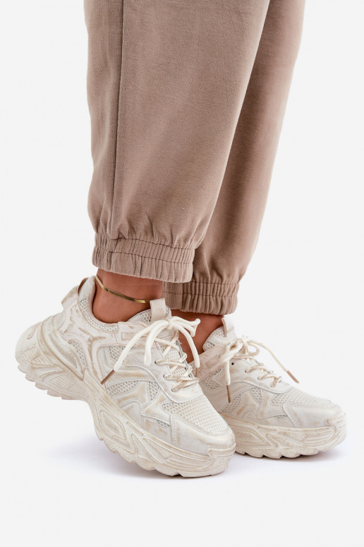 Botines de estilo sneaker para mujer Z con desgastes y plataforma en color arena SeladĮen