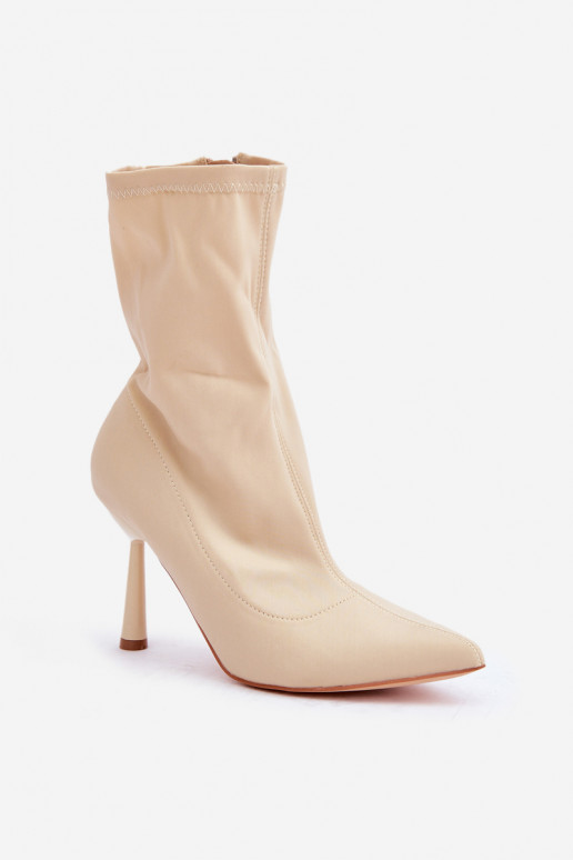 Botines con tacones delgados en color marfil Amune