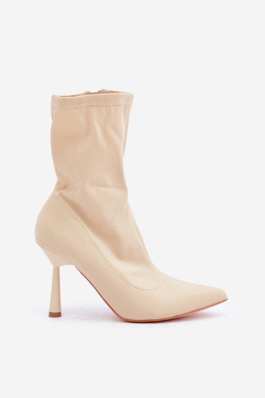 Botines con tacones delgados en color marfil Amune
