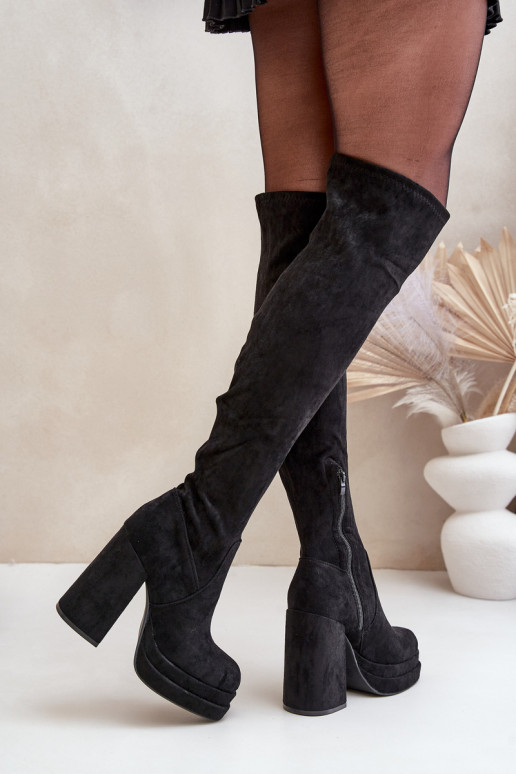 Botas largas con caña sobre la rodilla, con tacones y plataforma color negro Nadelian