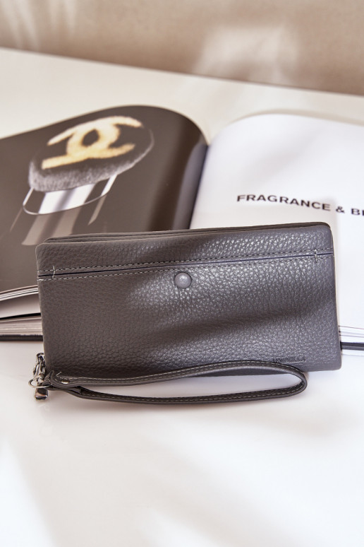 Cartera grande de mujer con una huella de cuero ecológico color gris Tiene quertiel