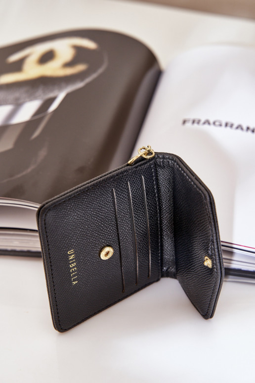 Estuche con tarjeta de color dorado con llavero de eco piel color negro Iritinme