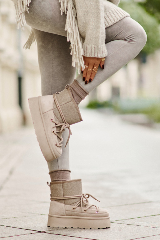 Botas de nieve con detalles elegantes... Botas de nieve con detalles elegantes...