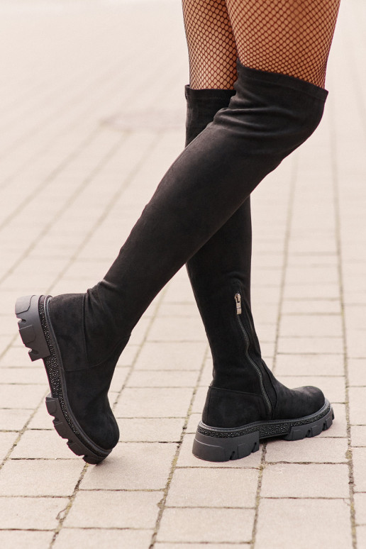 Botas altas de mujer sobre la rodilla... Botas altas de mujer sobre la rodilla...