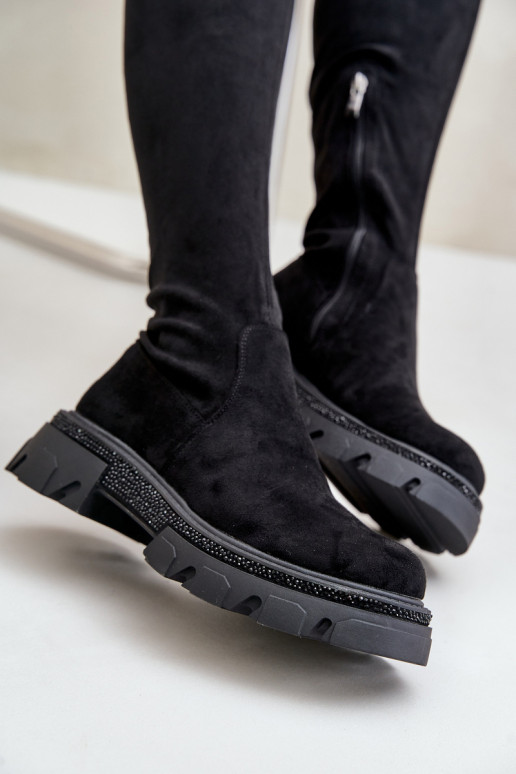 Botas altas de mujer sobre la rodilla... Botas altas de mujer sobre la rodilla...