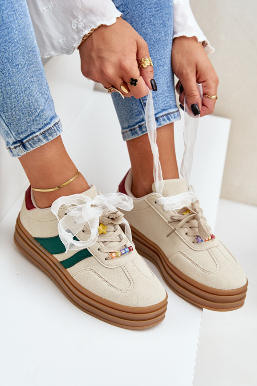 Zapatillas modelo zapatos. Femenino Z Przypinkami beige Jariana