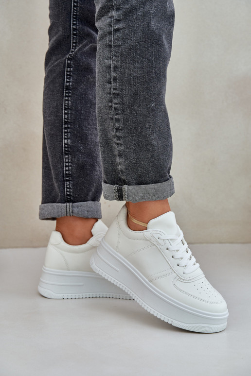 Zapatillas clásicas de cuero ecológico con una plataforma el color blanco Dorreia Zapatillas clásicas de cuero ecológico con una plataforma el color blanco Dorreia