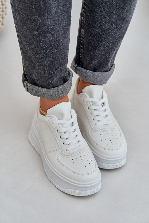 Zapatillas clásicas de cuero ecológico con una plataforma el color blanco Dorreia Zapatillas clásicas de cuero ecológico con una plataforma el color blanco Dorreia