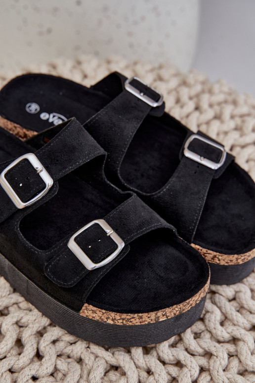 zapatillas de mujer con una plataforma con hebillas de color negro Aramia