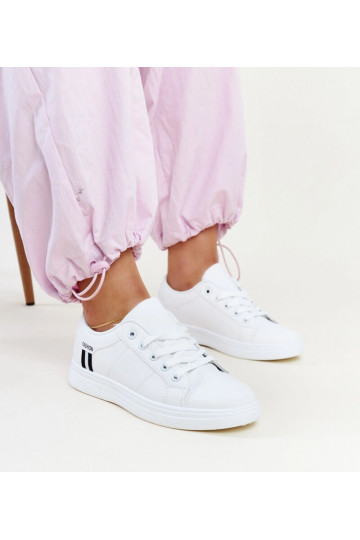 Zapatillas blancas de mujer...