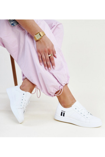 Zapatillas blancas de mujer... 2