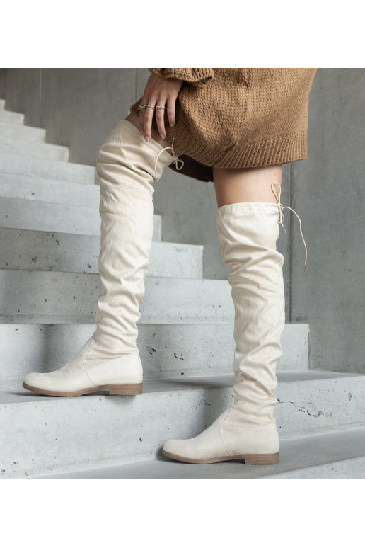 Botas largas beige con plataforma de... Botas largas beige con plataforma de...