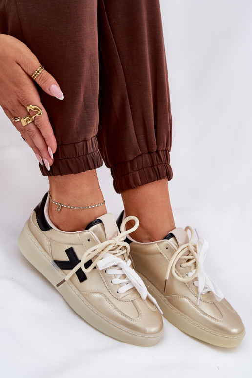 Bajo zapatillas Femenino color dorado Zelevelis