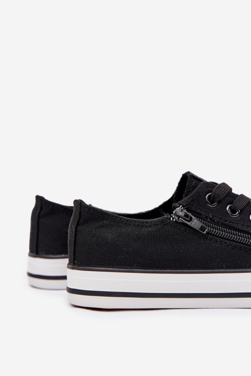 Infantil zapatillas de suela plana con cordones de color negro Tiene quergo