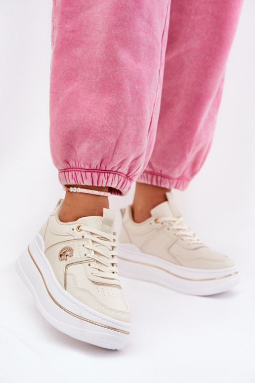 Femenino zapatillas con una plataforma beige Caldeno