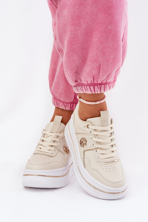 Femenino zapatillas con una plataforma beige Caldeno