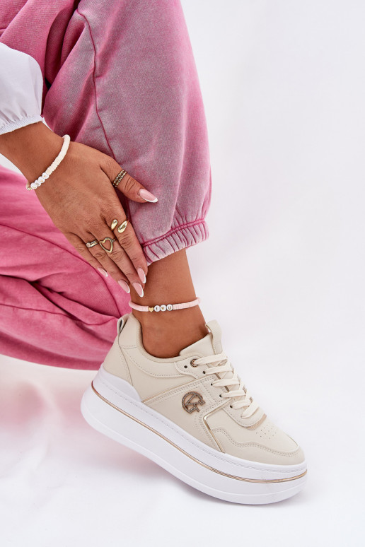 Femenino zapatillas con una plataforma beige Caldeno